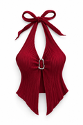 A deep red halter-neck top with a pleated texture, featuring a large bow at the neck and a silver-tone metal ring detail at the center front, shown against a plain white background.